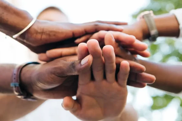 intercultural-hand-shake-outdoor